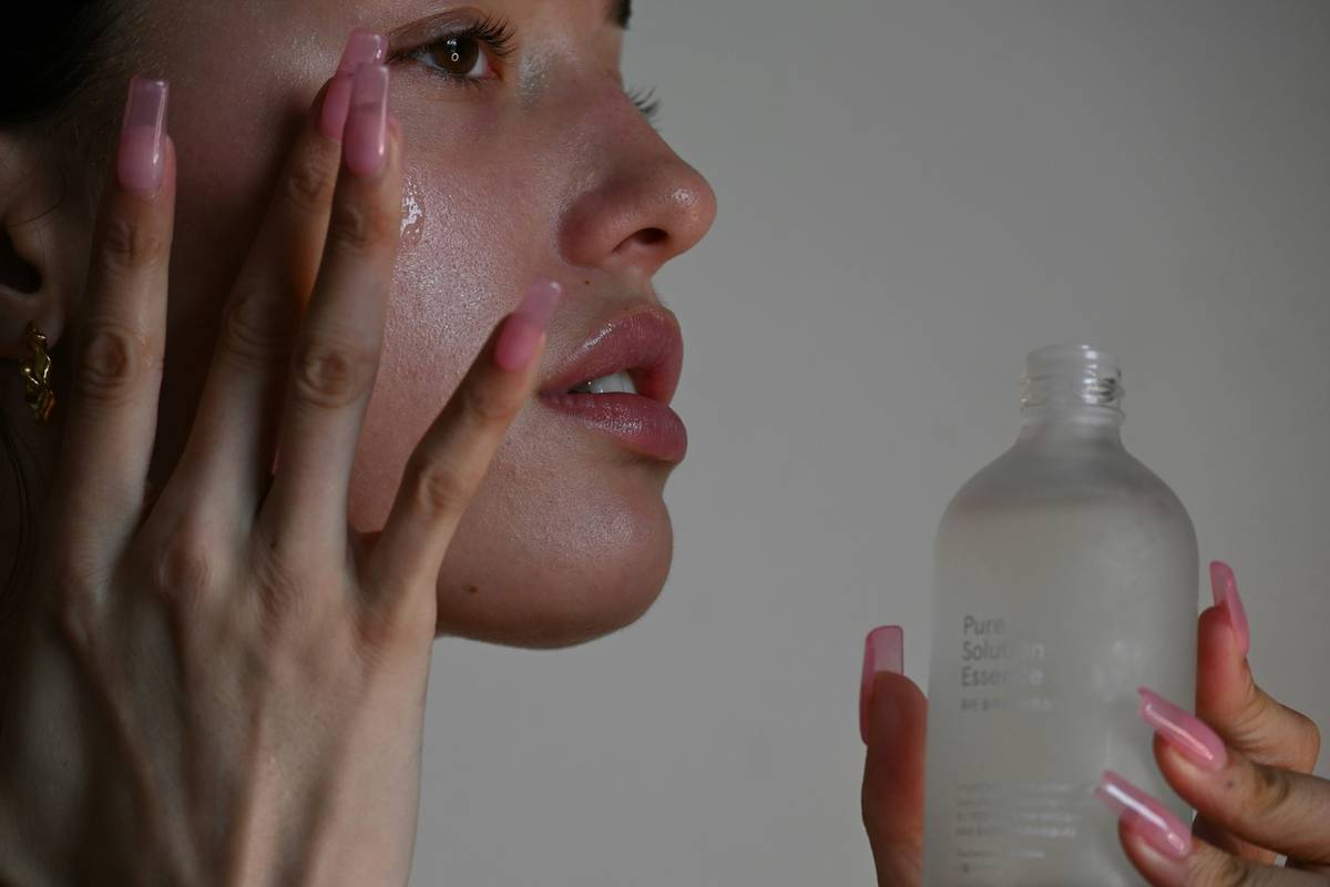 Nighttime glow up skin care routine showing retinoid application and ceramide moisturizer for deep repair